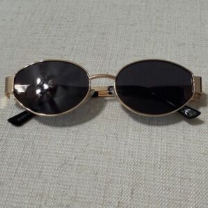 Gold Frame Black Lens Oval Sunglasses